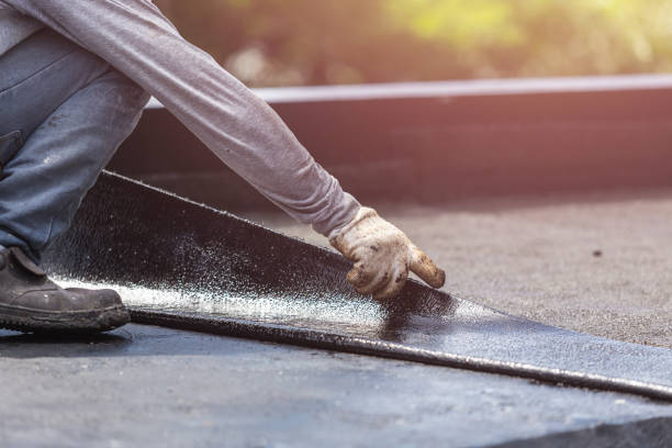 Professional Basement Waterproofing technician working in Hancock, MI